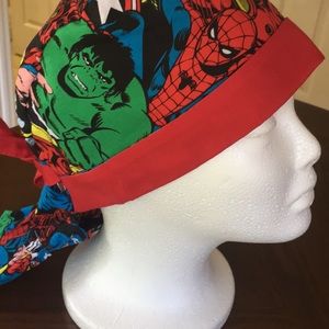 Surgical cap with pony tail holder